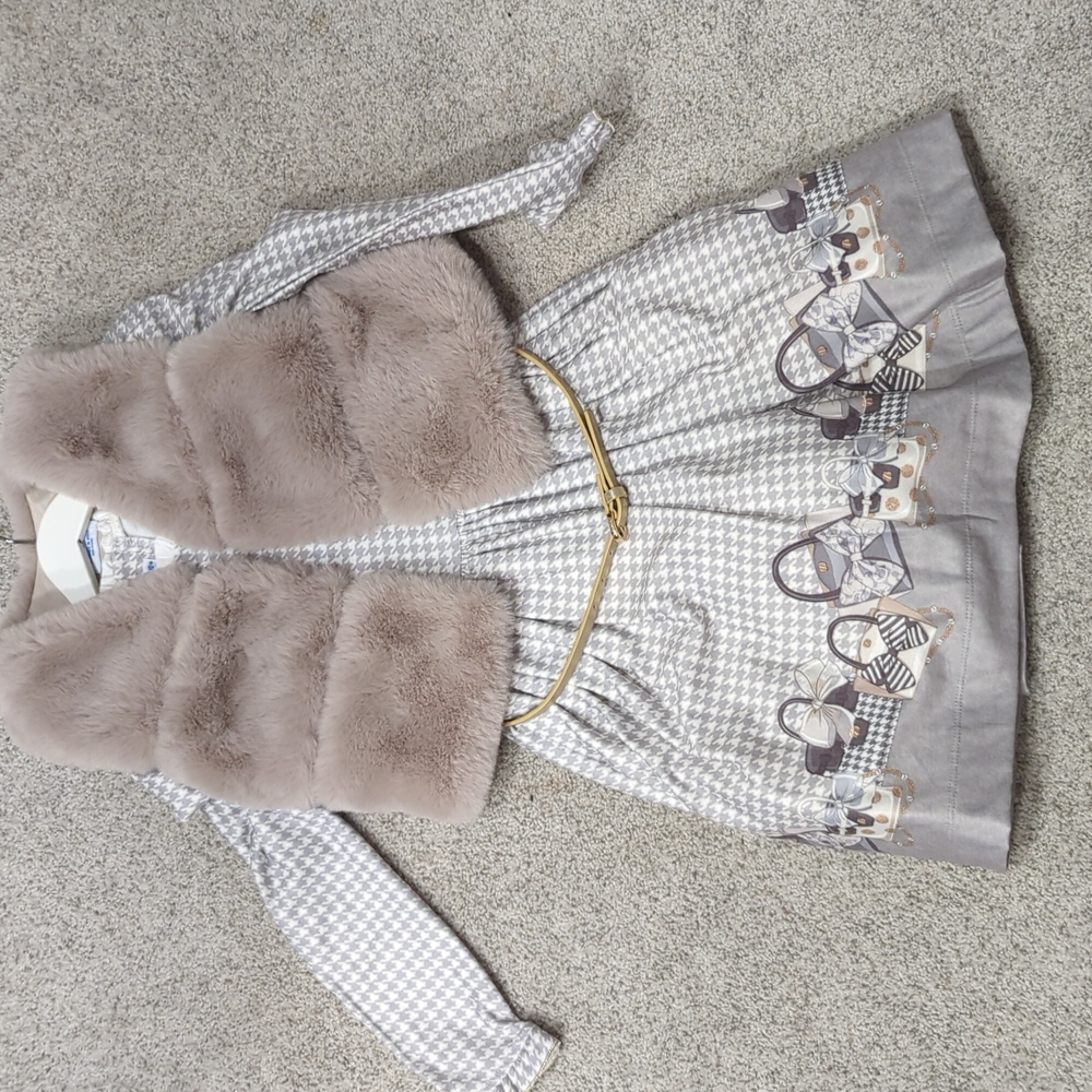 Girls dress with belt and faux fur vest.